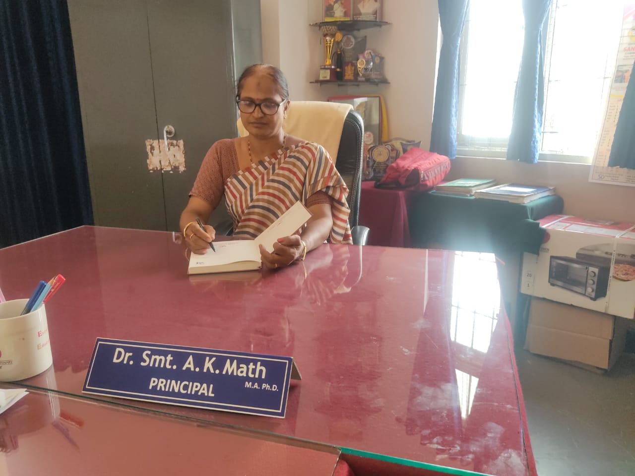 Dr. Smt. A.K. Math (Principal & Asso.Prof)